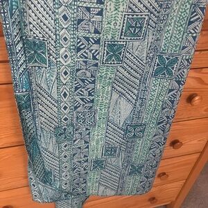 Hilo Hattie Hawaiian Turqoise and Green Sarong sheeting. Ties at neck.